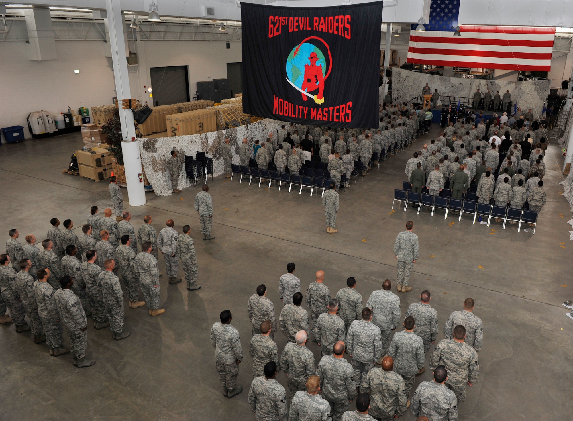 JOINT BASE MCGUIRE-DIX-LAKEHURST, N.J. – Members of the 816th Contingency Response Group watch the posting of the colors during the 816 CRG’s inactivation ceremony at the 621st Contingency Response Wing’s Global Reach Deployment Center here June 11. The unit was founded Mar. 1, 2005 and saw worldwide service as the wing’s first CRG. (U.S. Air Force photo/Tech. Sgt. Parker Gyokeres/released)