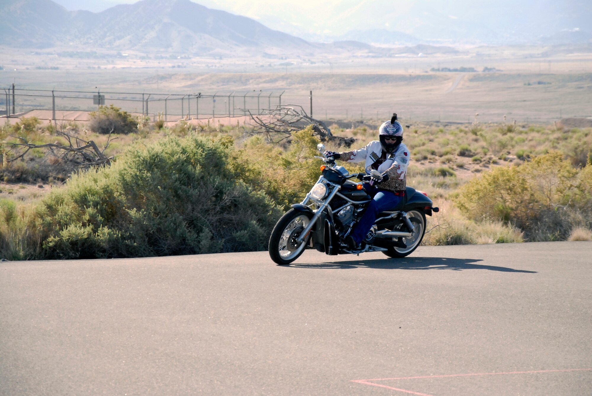 Kirtland AFB Experienced Rider Course student Julie Biladeau performs a training exercise May 28.  US Air Force Photo by Dan Harman