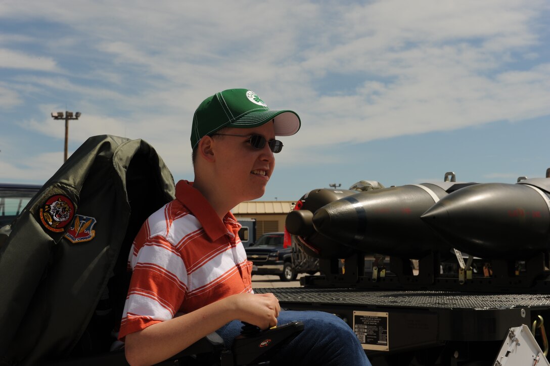 ELLSWORTH AIR FORCE BASE, S.D.-- Wade Ginkens receives a briefing on the B-1B Lancer during his visit here June 10. Wade participated in the "Aircrew for a Day" program which offers children with a serious illness a personalized experience on the base. (U.S. Air Force photo/Airman First Class Jarad Denton)

