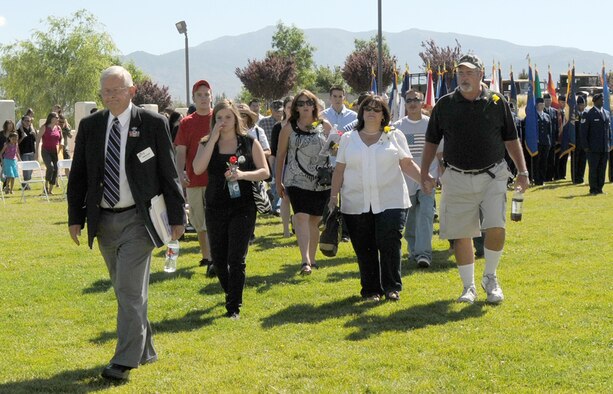 Family members of New Mexico fallen warriors arrive for the Memorial Day ceremony May 31 at the New Mexico Veterans Memorial.  Air Force Photo by Dennis Carlson