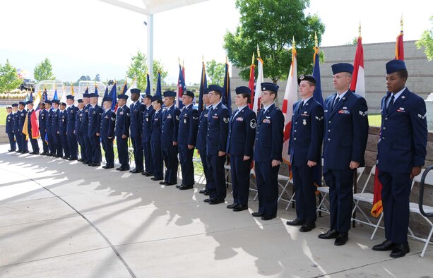 Team Kirtland volunteers participated in the parade of state flags during the Memorial Day observance at the New Mexico Veterans Memorial. A large audience gathered May 31 to honor those who have made the ultimate sacrifice for their country.  Air Force Photo by Dennis Carlson