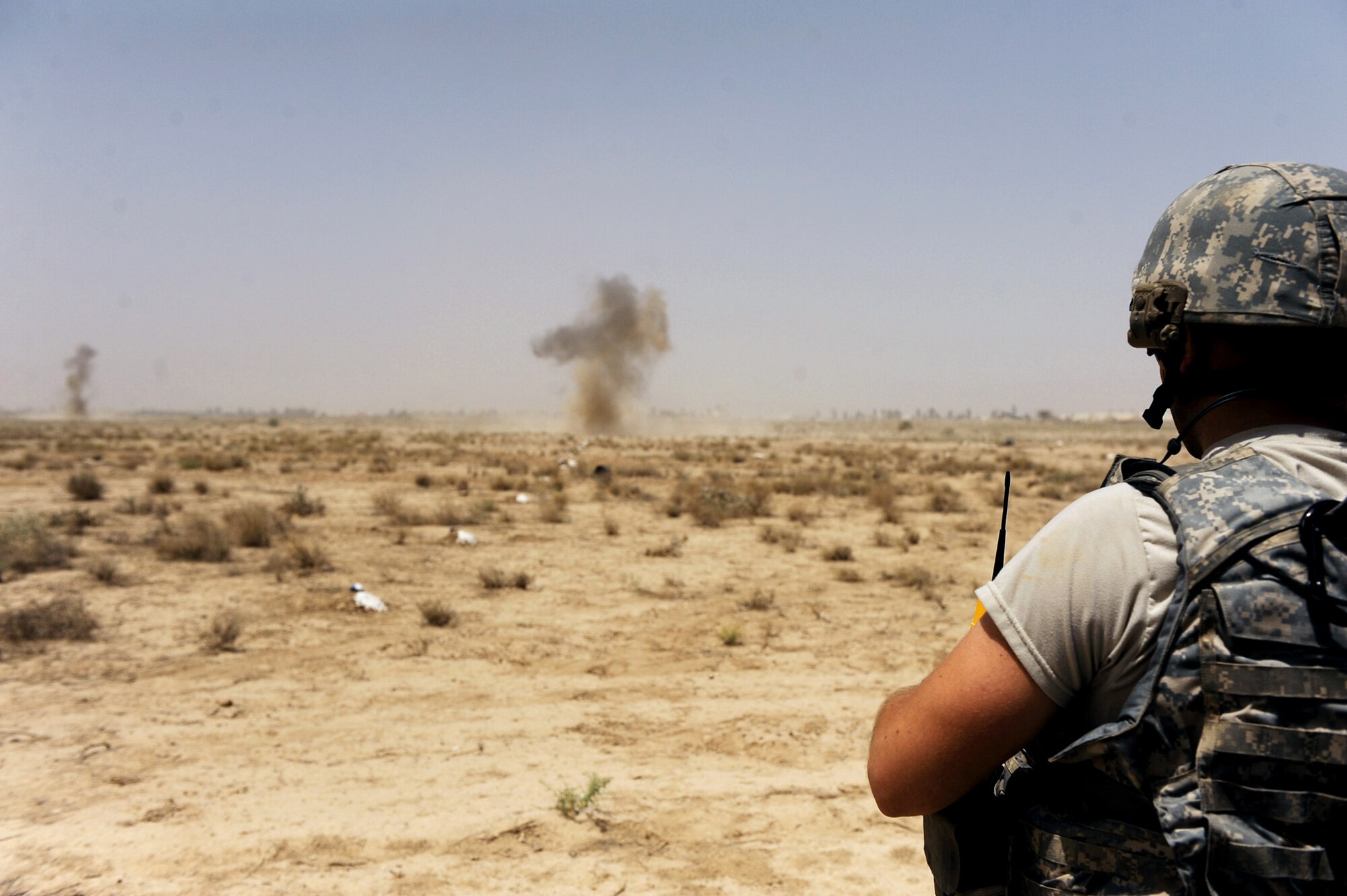 Staff Sgt. Benjamin Stewart detonates C-4 charges destroying M-42 bomblets littering a field June 4, 2010, in Kandahar City, Afghanistan. Eight teams of Afghan deminers working with the Army Corps of Engineers have uncovered more than 500 munitions including M-42 bomblets, 120 mm rockets, rocket propelled grenades, 105 mm projectiles and 82 mm mortars. Once Afghan de-miners uncover the various munitions, 755th Air Expeditionary Squadron, Operating Location-Bravo explosive ordnance disposal technicians are called in to destroy them. Sergeant Stewart is an explosive ordnance disposal technician assigned to the 755th AES, Operating Location-Bravo EOD team. (U.S. Air Force photo/Staff Sgt. Manuel J. Martinez)