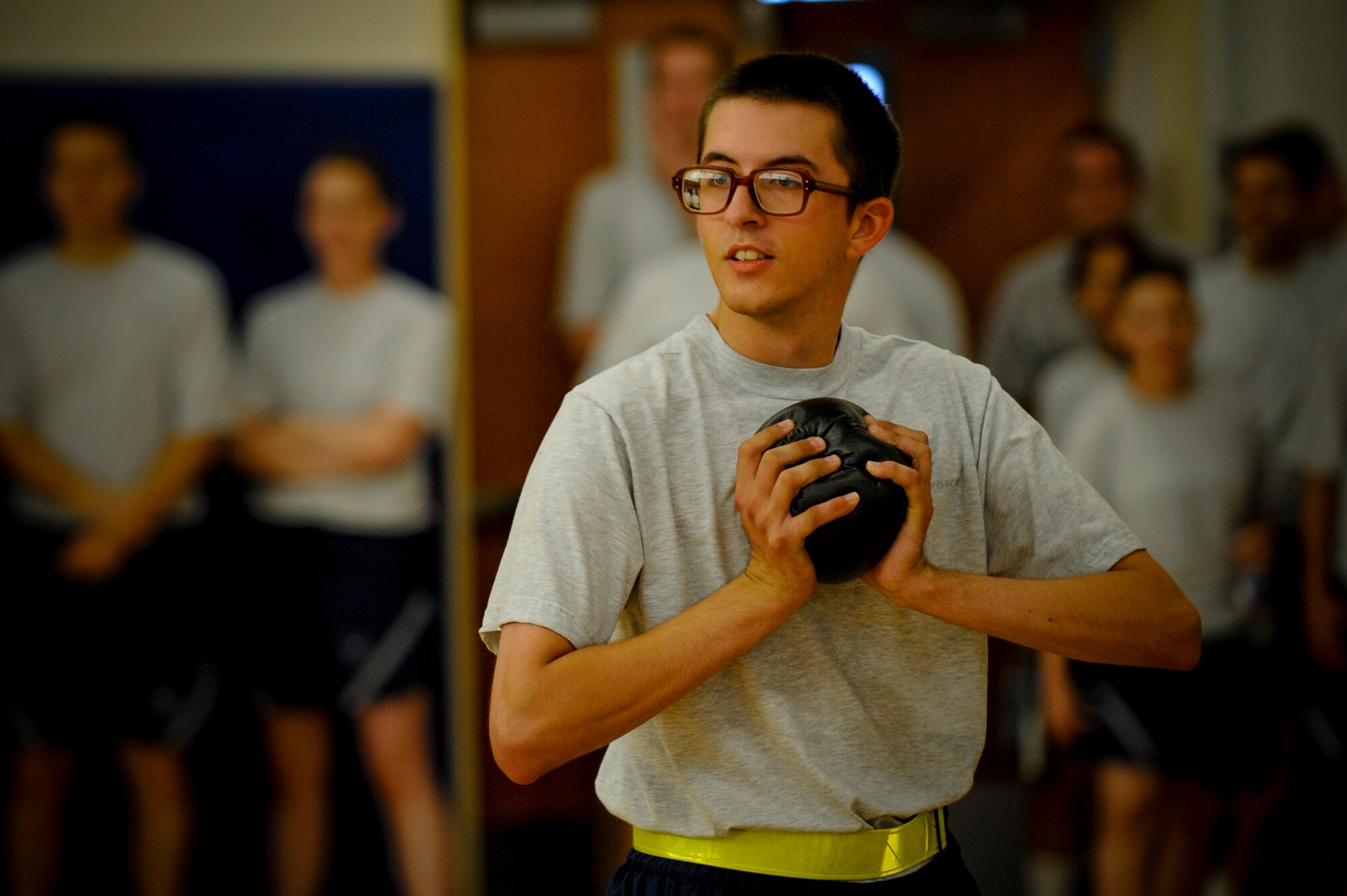 Airman 1st Class James Rodrick, 6th Operations Group, participates in a game of dodgeball during the 6th Air Mobility Wing Sports Day at MacDill Air Force Base, Fla., Jun. 11, 2010.  Members from the 6 AMW participated in a number of different sporting events during Sports Day to promote fun and camaraderie.  (U.S. Air Force photo by Staff Sgt. Joseph L. Swafford Jr./Released)