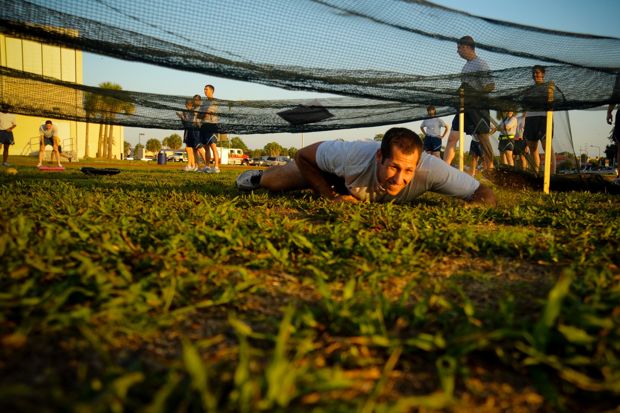 Senior Airman Christian Peterson, 6th Aircraft Maintenance Squadron, competes in a obstacle course challenge during the 6th Air Mobility Wing Sports Day at MacDill Air Force Base, Fla., Jun. 11, 2010.  Members from the 6 AMW participated in a number of different sporting events during Sports Day to promote fun and camaraderie.  (U.S. Air Force photo by Staff Sgt. Joseph L. Swafford Jr./Released)