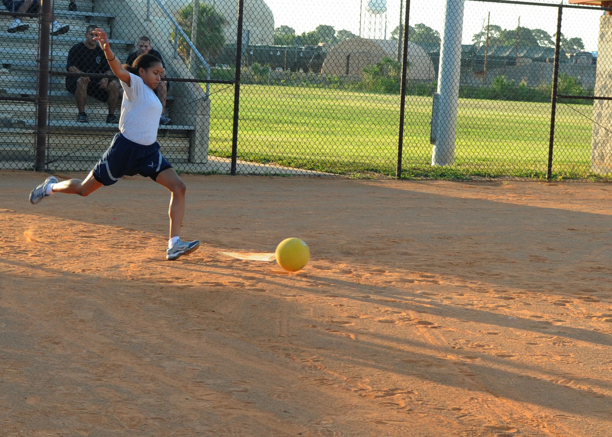 Airman 1st Class Vesta Page, 6th Medical Support Squadron pharmacy technician, prepares to kick the ball in a game of kickball during the 6th Air Mobility Wing Sports Day at MacDill Air Force Base, Fla., June 11, 2010.  Members from the 6 AMW participated in a number of different sporting events during Sports Day to promote fun and camaraderie.   
(U. S. Air Force photo by Senior Airman Linzi Joseph)	
