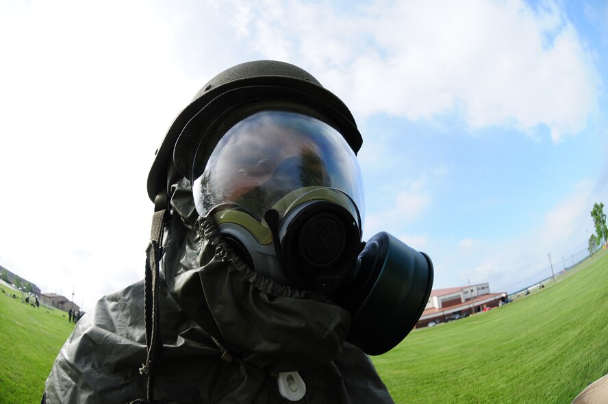 914th Airlift Wing Airmen train in their Mission Oriented Protective Posture suits during the June Unit training assembly June 4 at the Niagara Falls Air Reserve Station, Niagara Falls, NY. Incase of a chemical, biological or nuclear attack, all Airmen are required complete MOPP training in full gear before a deployment to a warzone. (U.S. Air Force Photo by Staff Sgt. Joseph McKee)