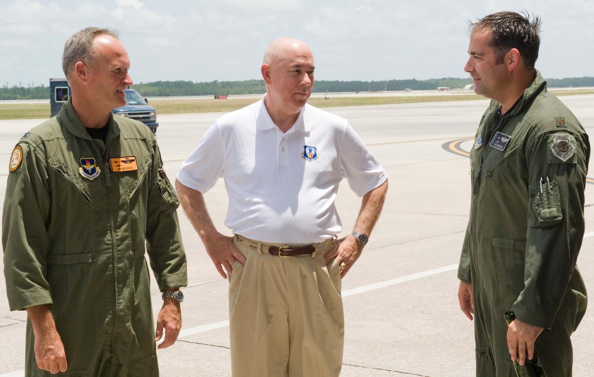 Maj. Gregory Moseley, 325th Operations Support Squadron, talks with his father and (then) Colonel James Browne, 325th Fighter Wing commander after he performed his final flight with the 325th FW June 4.  Gen. (Ret.) T. Michael Moseley, father of Major Moseley and 18th U.S. Air Force chief of staff, was in attendance for his son’s fini-flight and General Browne’s promotion.  (U.S. Air Force photo by Jonathan Gibson)