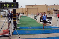 Capt. James Bales is the first to cross the finish line in the men's  Armed Force Triathlon Championship June 5 at Naval Base Ventura County, Calif. (U.S. Navy photo/Mass Communications Specialist 1st Class Aaron Peterson)