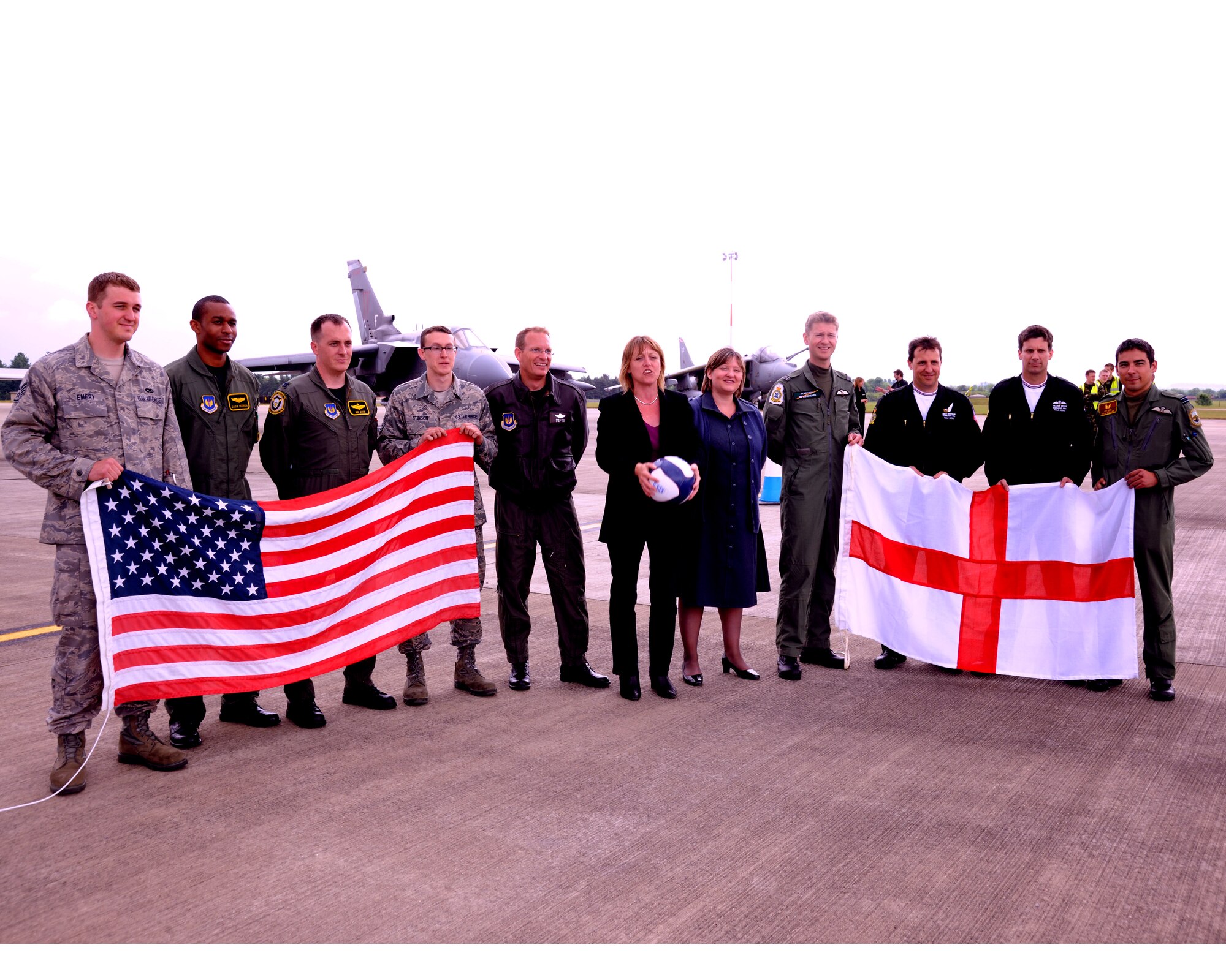 RAF FAIRFORD, United Kingdom - Air crew from RAF Lakenheath and Mildenhall stand for pictures with British air crew during the Royal International Air Tattoo Media Day Launch June 9. The media launch promoted the world's largest airshow, RIAT, July 17 and 18. (U.S. Air Force photo by Staff Sgt. Joel Mease)