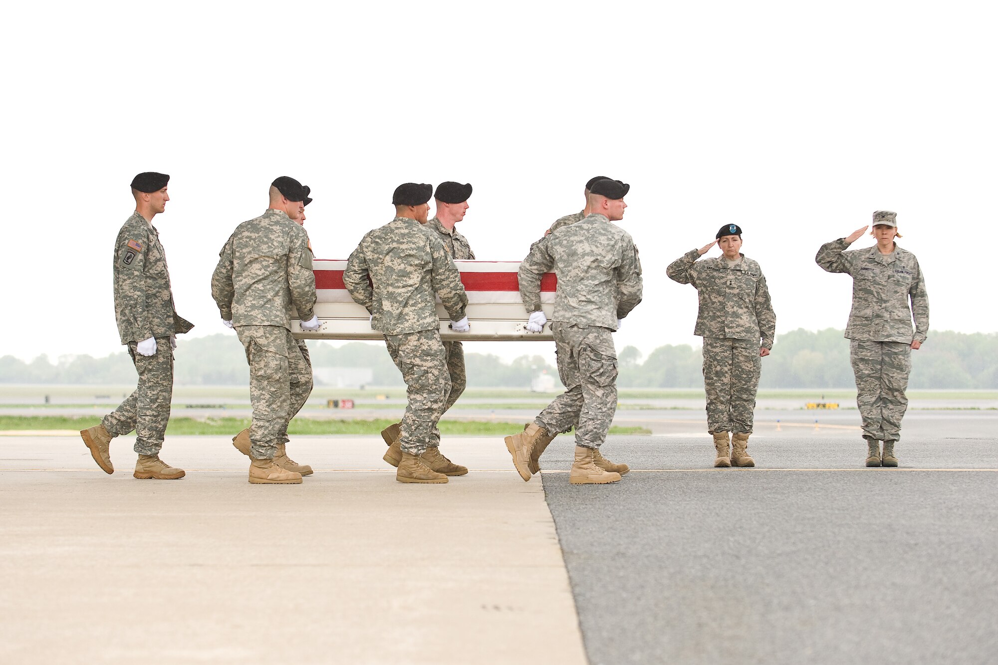 A U.S. Army carry team transfers the remains of Army Pfc. Charlie C. Antonio, of Kahului, Hawaii, at Dover Air Force Base, Del., April 21. (U.S. Air Force photo/Roland Balik)