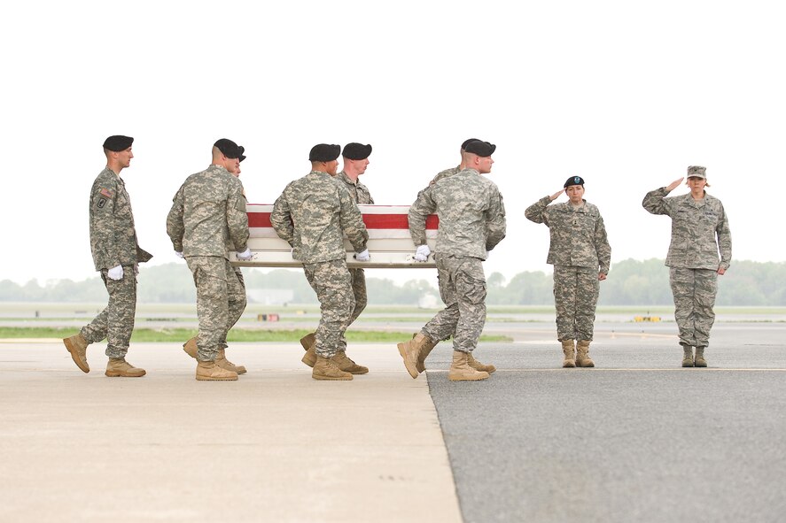 A U.S. Army carry team transfers the remains of Army Pfc. Charlie C. Antonio, of Kahului, Hawaii, at Dover Air Force Base, Del., April 21, 2010. Antonio was assigned to the 1st Battalion, 8th Infantry Regiment, 3rd Brigade Combat Team, 4th Infantry Division, Fort Carson, Colo. He died April 18 in Annassar, Iraq, of injuries sustained in a non-combat-related incident. (U.S. Air Force photo/Roland Balik) 