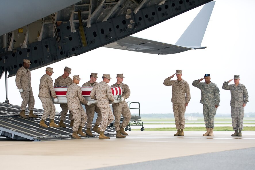 A U.S. Marine Corps team transfers the remains of Marine Corps Cpl. Kurt S. Shea, of Frederick, Md., at Dover Air Force Base, Del., May 12. Cpl. Shea was assigned to 3rd Battalion, 10th Marine Regiment, 2nd Marine Division, II Marine Expeditionary Force, Camp Lejeune, N.C. (U.S. Air Force photo/Roland Balik)