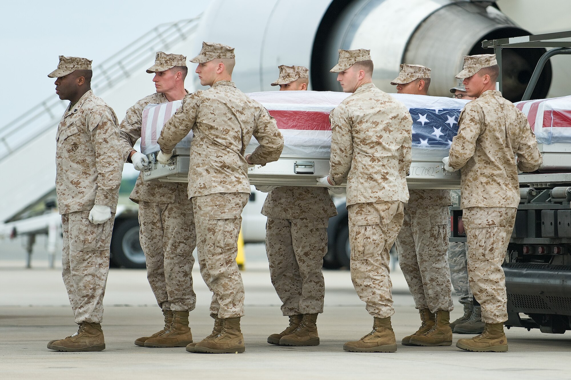 A U.S. Marine Corps team transfers the remains of Marine Corps Cpl. Nicholas D. Paradarodriguez, of Fredericksburg, Va., at Dover Air Force Base, Del., May 17. (U.S. Air Force photo/Roland Balik)