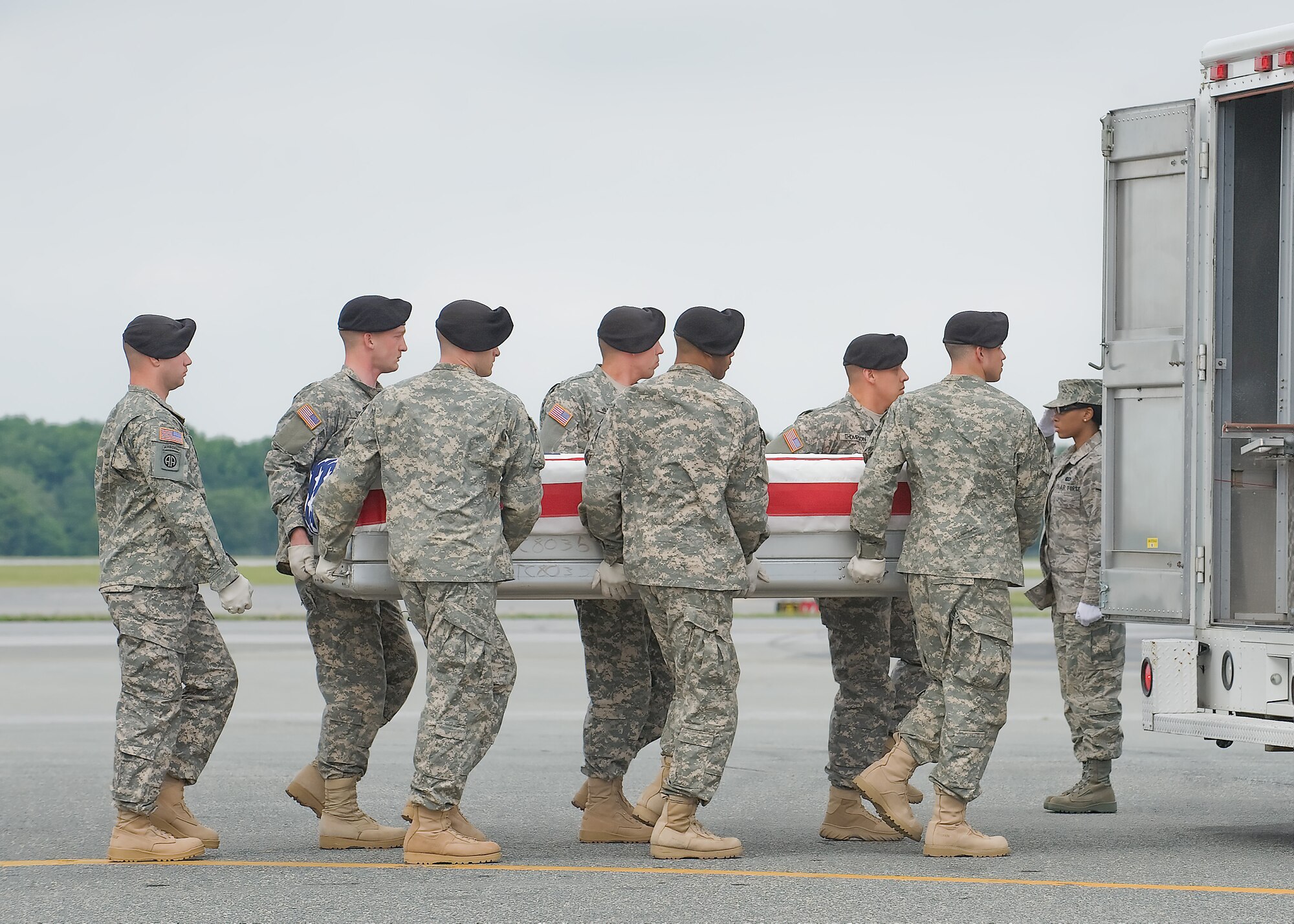 A U.S. Army carry team transfers the remains of Army Pfc. Billy Gene Anderson of Alexandria, T.N. , at Dover Air Force Base, Del., on May 19, 2010. (U.S. Air Force photo/Brianne Zimny)