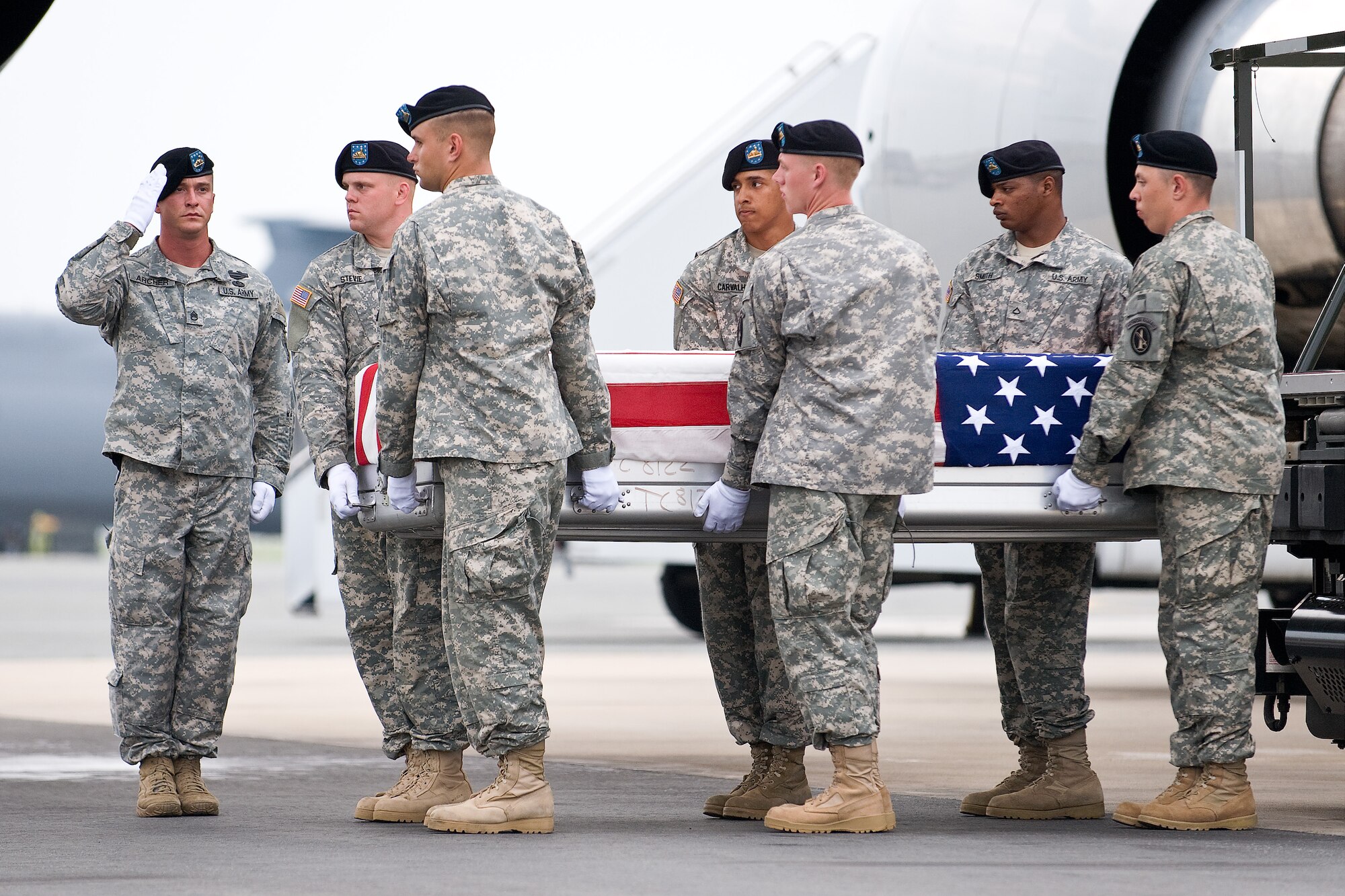 A U.S. Army carry team transfers the remains of Army 1st Lt. Joseph J. Theinert, of Sag Harbor, N.Y., at Dover Air Force Base, Del., June 5. (U.S. Air Force photo/Roland Balik)