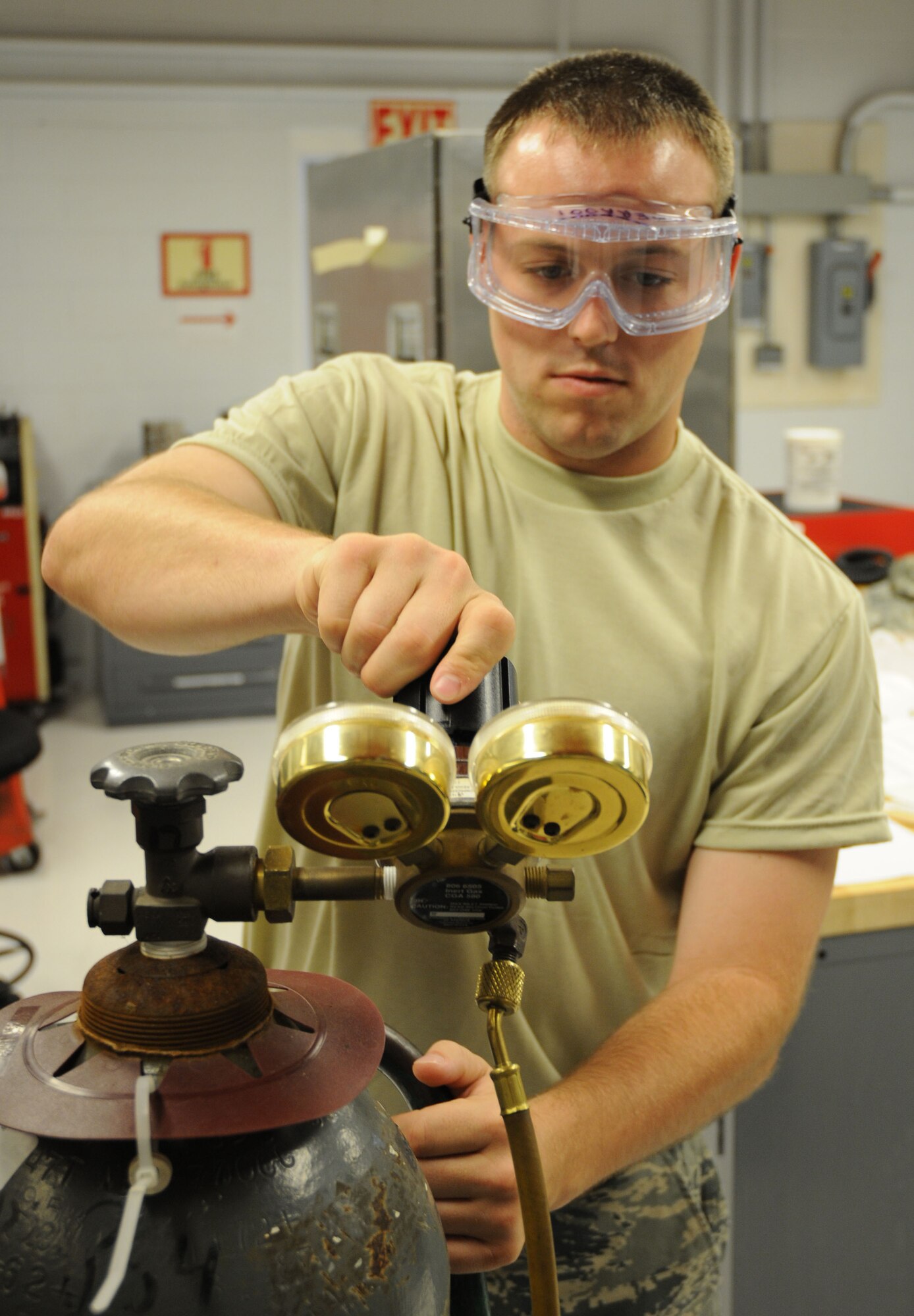 Staff Sgt. Rodney Douglas, an electrical and environmental systems journeyman with the 512th Aircraft Maintenance Squadron, uses nitrogen to check an aircraft refridgerator for leaks. The six reservists assigned to the 512th Electrical and Environmental Systems shop troubleshoot, inspect and repair aircraft electrical and environmental systems and associated support equipment. Sergeant Douglas is a reservists assigned to the 512th Airlift Wing, the only Air Force Reserve Command unit in Delaware. (U.S. Air Force photo/Capt. Marnee A.C. Losurdo)