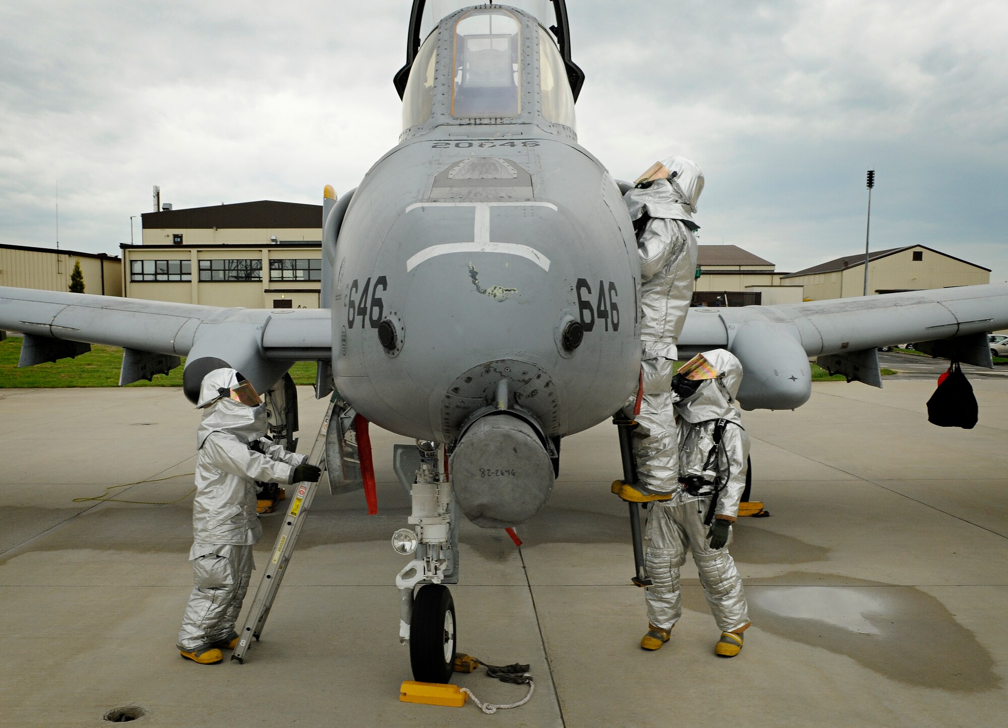 SPANGDAHLEM AIR BASE, Germany – Firefighters from the 52nd Civil Engineer Squadron demonstrate how to extract a pilot from a damaged aircraft during an exercise June 10. The fire department performed an exercise to show their capabilities to visiting fire and emergency responders from Germany, Bulgaria and Romania. (U.S. Air Force photo/Senior Airman Benjamin Wilson)