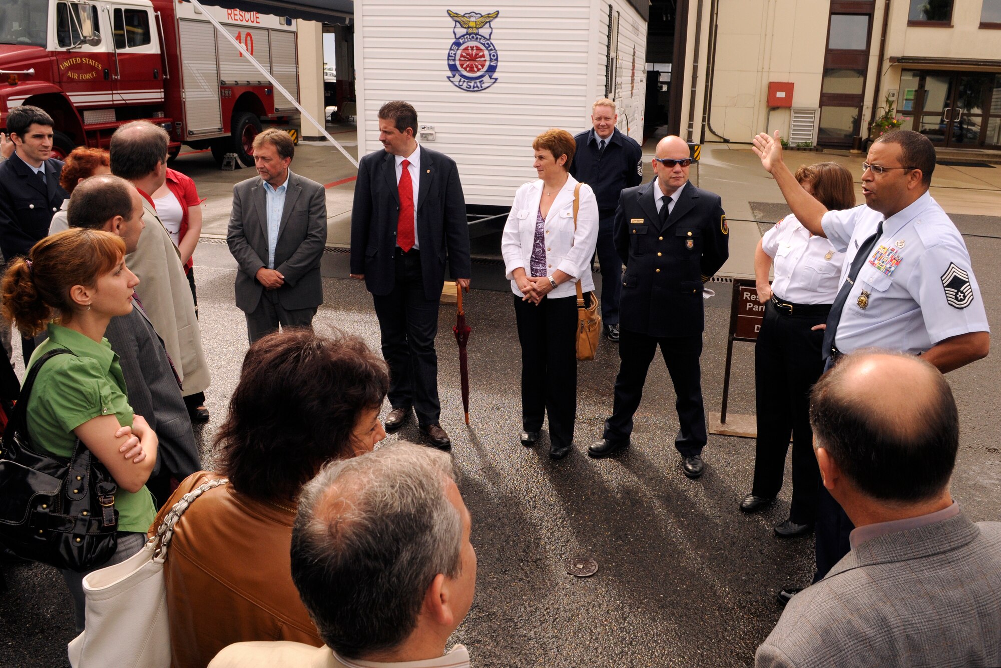 SPANGDAHLEM AIR BASE, Germany – Chief Master Sgt. Robert Appling, 52nd Civil Engineer Squadron fire chief, speaks to a group visiting the fire department here June 10. German, Bulgarian and Romanian fire and emergency responders visited the base to exchange ideas and strengthen relationships. (U.S. Air Force photo/Senior Airman Benjamin Wilson)