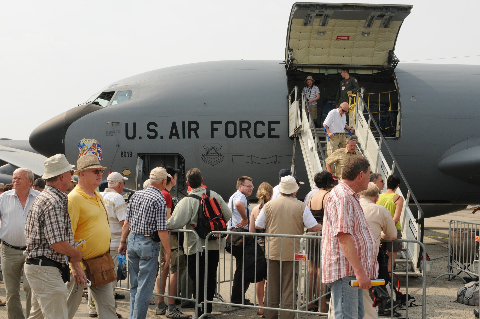 Visitors wait in line to see the KC-135 Stratotanker during the ILA 2010 Berlin International Aerospace Exhibition and Conferences June 10. The Berlin Air Show is a weeklong event that showcases various aviation technologies from all over the world. (U.S. Air Force photo/Staff Sgt. Julius Delos Reyes)