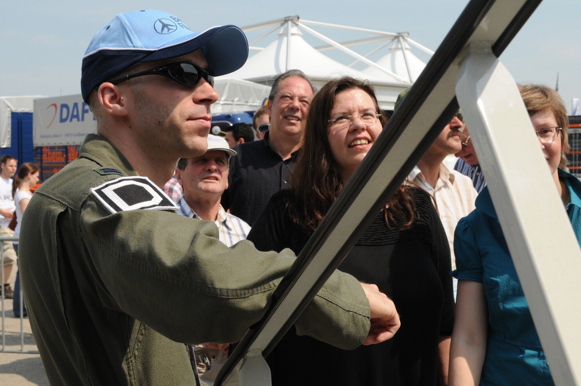 Capt. Owen Walker, 351st Air Refueling Squadron KC-135 Stratotanker pilot from Royal Air Force Mildenhall, United Kingdom, waits to guide visitors during the ILA 2010 Berlin International Aerospace Exhibition and Conferences June 10. The KC-135 crew showed off the aircraft’s capabilities. (U.S. Air Force photo/Staff Sgt. Julius Delos Reyes)