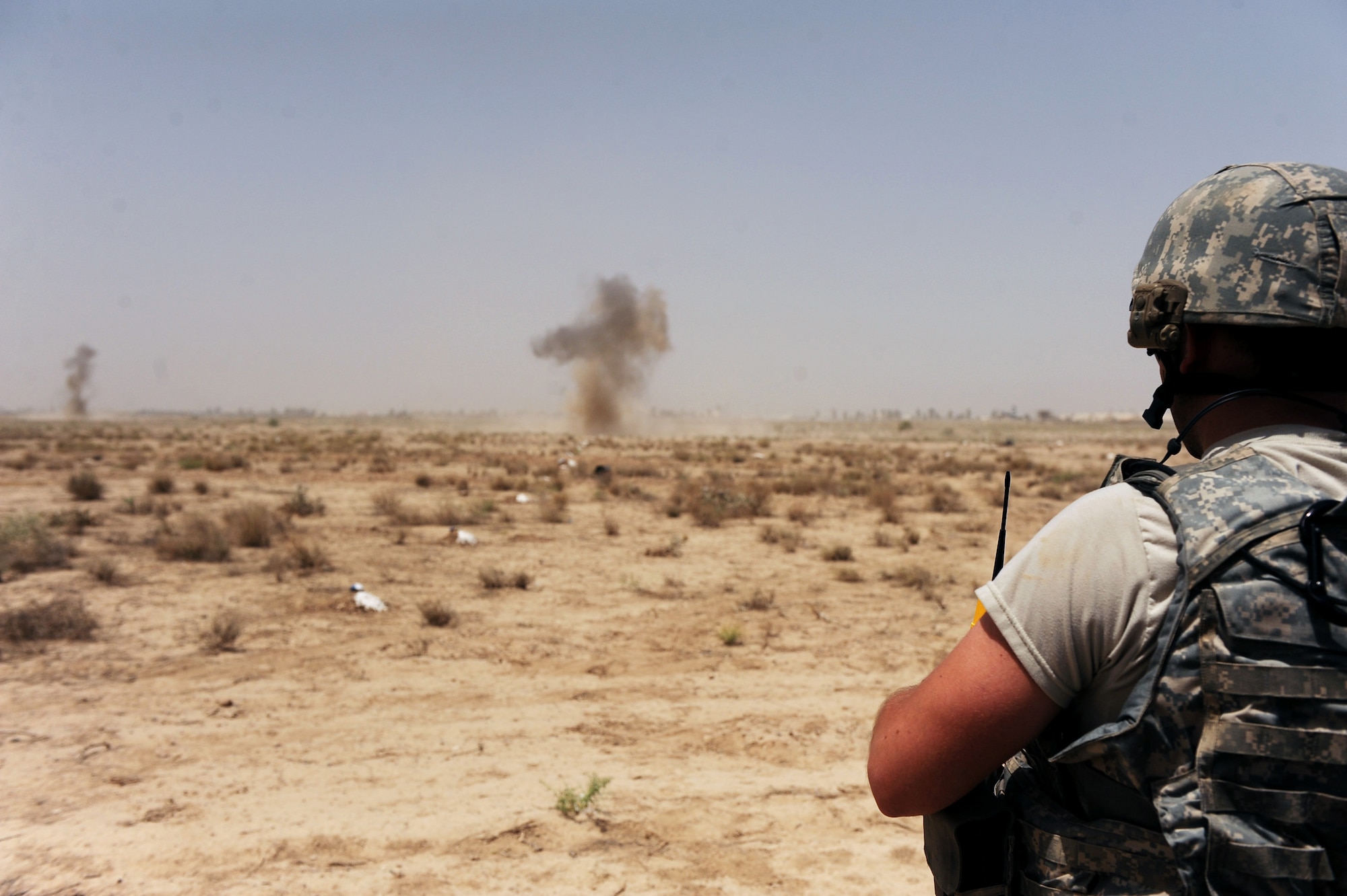 Staff Sgt. Benjamin Stewart, an explosive ordnance disposal technician assigned to the 755th Air Expeditionary Squadron, Operating Location-Bravo EOD, detonates C-4 charges destroying M-42 bomblets littering a field June 4, 2010, in Kandahar City, Afghanistan. Eight teams of Afghan deminers working with the Army Corps of Engineers have uncovered more than 500 munitions including M-42 bomblets, 120 mm rockets, rocket propelled grenades, 105 mm projectiles and 82 mm mortars. Once Afghan de-miners uncover the various munitions, 755th OL-B EOD technicians are called in to destroy them.  (U.S. Air Force photo/ Staff Sgt. Manuel J. Martinez/released)
