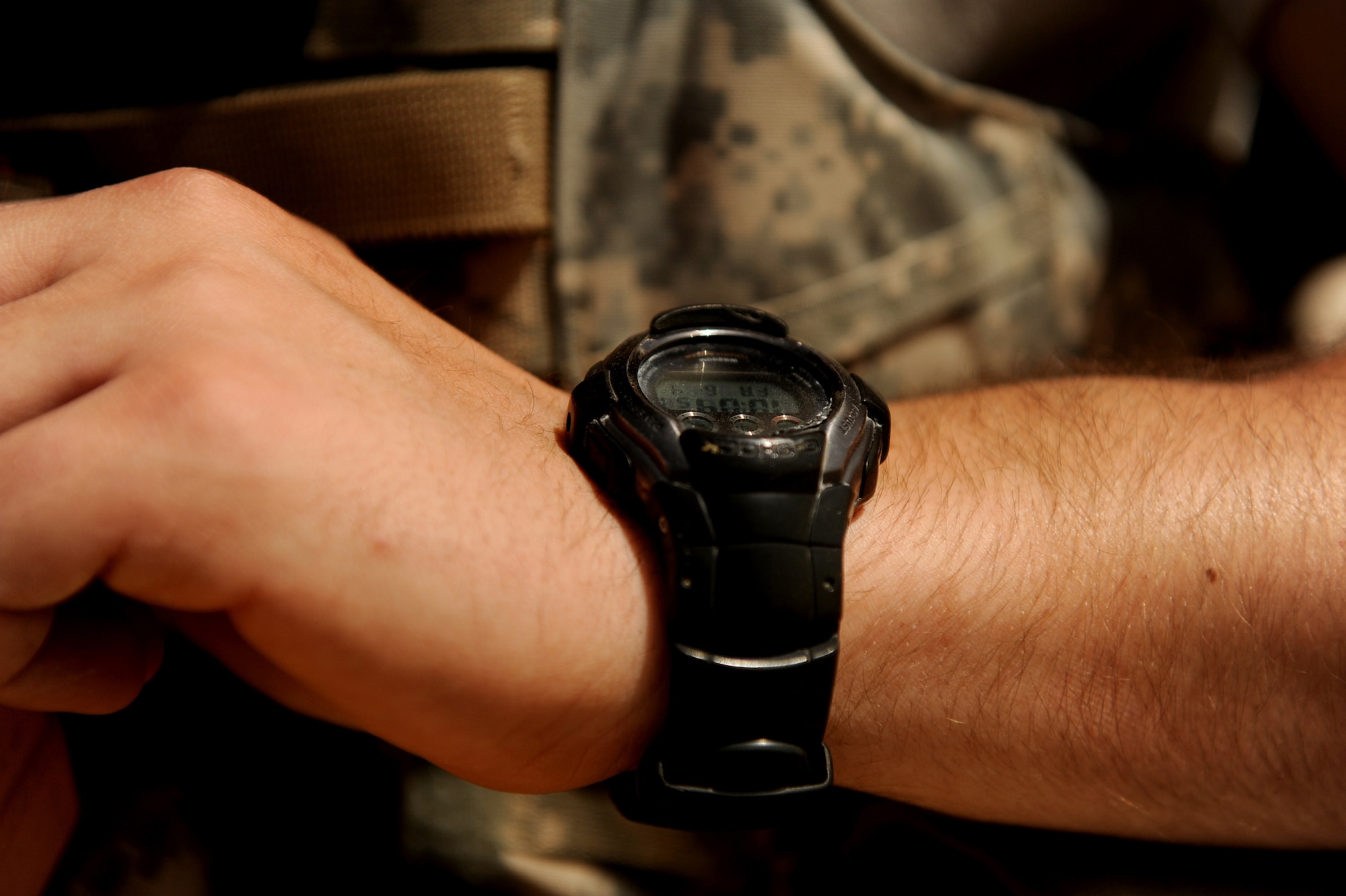 Staff Sgt. Benjamin Stewart, an explosive ordnance disposal technician assigned to the 755th Air Expeditionary Squadron, Operating Location-Bravo EOD, waits to set off C-4 charges to destroy M-42 bomblets June 4, 2010, in Kandahar City, Afghanistan. ?Time to do it again,? said Sergeant Niedzwiadek, a native of Egg Harbor, N.J., while looking at his watch and smiling. ?I love this part. Fire in the hole! Fire in the hole! Fire in the hole!?(U.S. Air Force photo/ Staff Sgt. Manuel J. Martinez/released)
