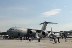 Visitors line up to see the C-17 Globemaster III "Spirit of Berlin" from Joint Base Charleston, S.C., during the ILA 2010 Berlin International Aerospace Exhibition and Conferences June 9 at the Berlin-Schoenefeld Airport. (U.S. Air Force photo/Staff Sgt. Julius Delos Reyes)