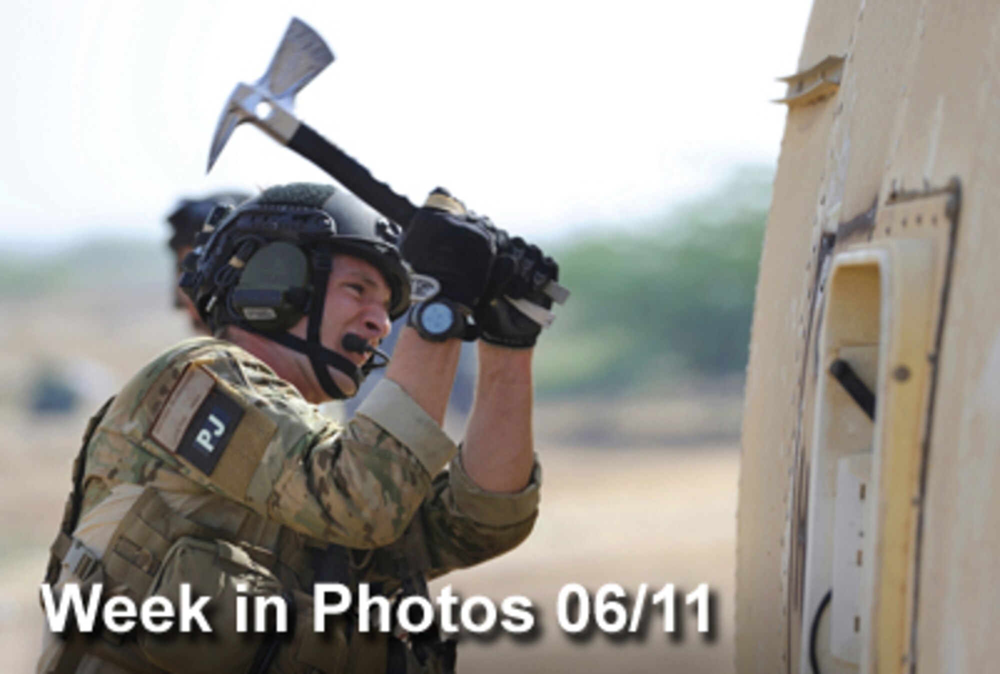 Air Force Week in Photos for June 11, 2010, highlights photos from around the Air Force. In this photo by Master Sgt. Jeremiah Erickson, a pararescueman cuts his way into the "wreckage" of an aircraft during a combat search and rescue extraction exercise June 1, 2010, outside Camp Lemonnier, Djibouti. (U.S. Air Force photo illustration) 