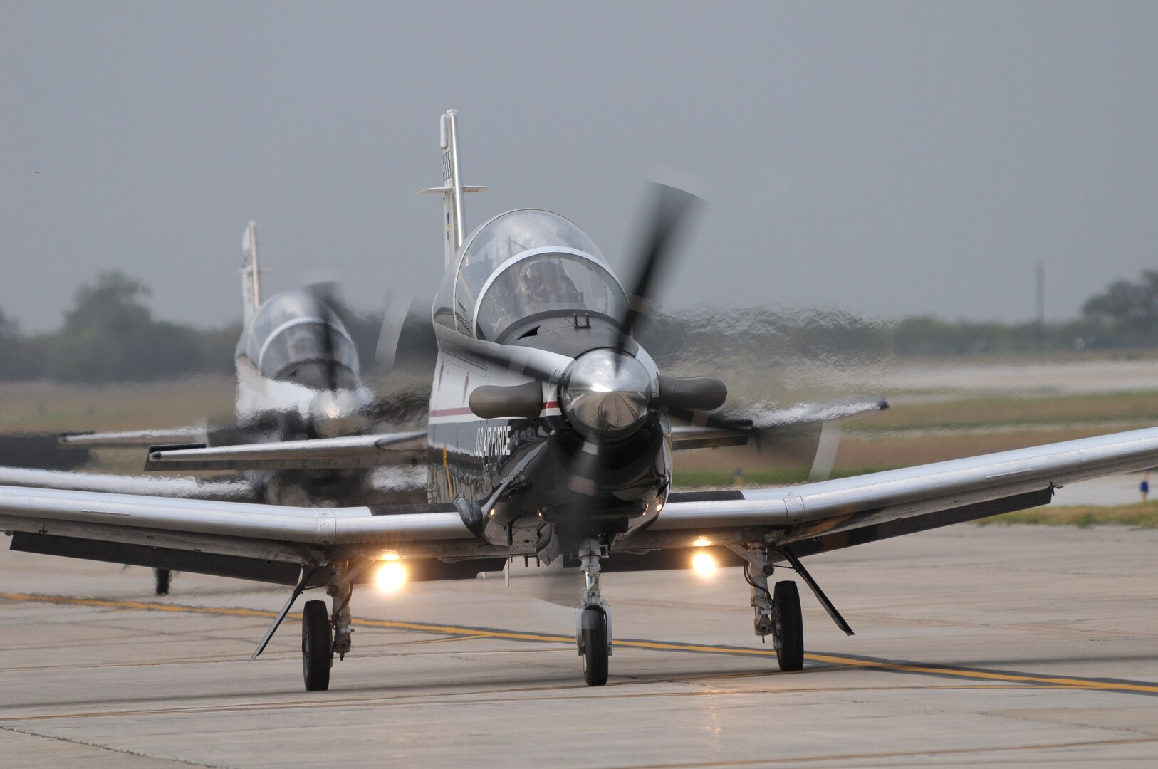 T6 aircrafts taxi toward the runway at Randolph AFB, Texas May 28, 2010.