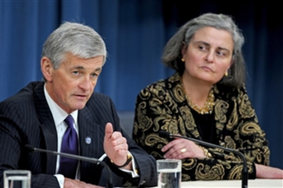 Secretary of the Army John M. McHugh announces he is placing Kathryn Condon (right), currently special assistant to the undersecretary of the army, in the newly created role of Executive Director of the Army National Cemeteries Program during a Pentagon press briefing on June 10, 2010.  