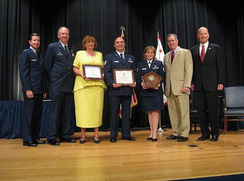 Award ceremony held April 16, 2010 at the Pentagon to recognize Homestead Air Reserve  Base Airman & Family Readiness Office as the 2009 AFRC winner of the DOD Reserve Family Readiness award. From left to right: Maj. Gen. David Commons, Col. Michael McCully, A&FR Dir. Deana Jacobs, Master Sgt. Felipe Garcia, Tech. Sgt. Destiny Miner, Secretary Dennis M. McCarthy, Assistant Secretary of Defense (Reserve Affairs) and Vice Adm. Norb Ryan Jr., USN-Ret. (U.S. Air Force photo/Chief Master Sgt. Beatriz Swann)