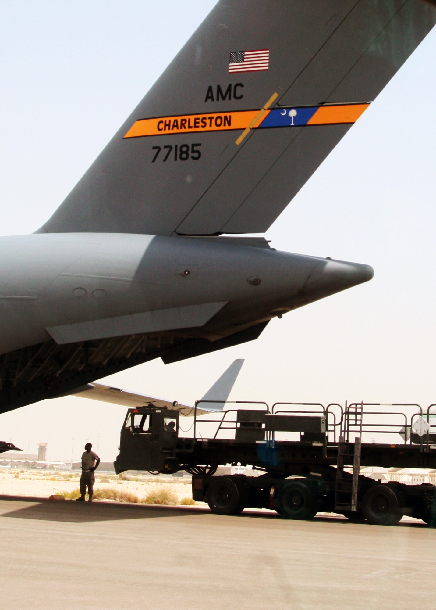 Air transportation Airmen from the 380th Expeditionary Logistics Readiness Squadron's Air Terminal Operations Center drives a 60,000-pound-capable aircraft loader to unload a plane during operations for the 380th Air Expeditionary Wing at a non-disclosed base in Southwest Asia on  May 19, 2010. The 380th AEW supports operations Iraqi Freedom and Enduring Freedom and the Combined Joint Task Force-Horn of Africa. All air transportation Airmen deployed with the 380th AEW are deployed from the 89th Aerial Port Squadron at Joint Base Andrews, Md. (U.S. Air Force Photo/Master Sgt. Scott T. Sturkol/Released)