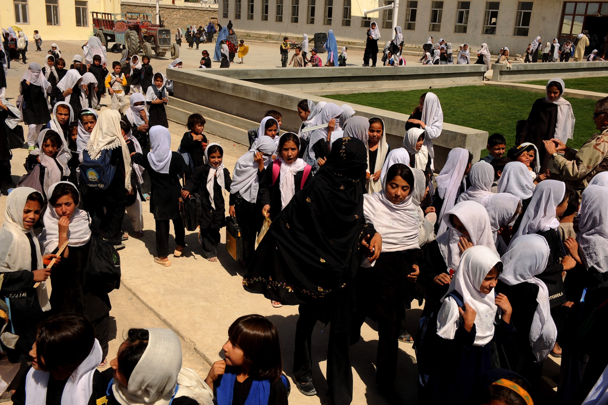 Afghan students who attend the morning session are released for the day, at the Bibi Khala Girl's School May 31, 2010, in Qalat City, Afghanistan. Partnering with Zabul Province government officials, Airmen from Provincial Reconstruction Team Zabul are making school life more pleasant by overseeing improvements for 1,200 Afghan high school and elementary students at the girls school.  (U.S. Air Force photo/Staff Sgt. Manuel J. Martinez/released) 


