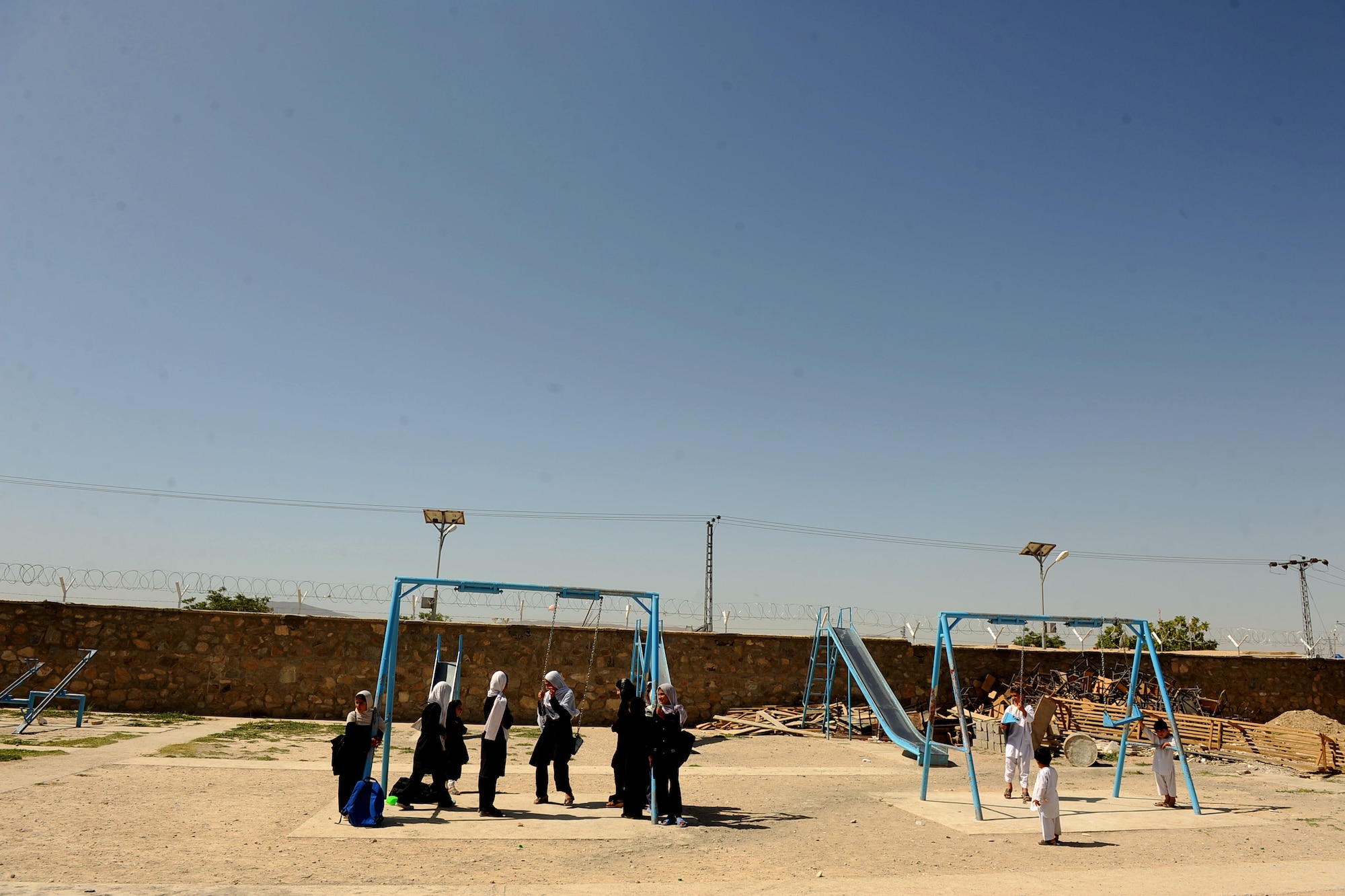 Afghan children play on the playground of the Bibi Khala Girl?s School May 31, 2010, in Qalat City, Afghanistan. (U.S. Air Force photo/Staff Sgt. Manuel J. Martinez/released) 
