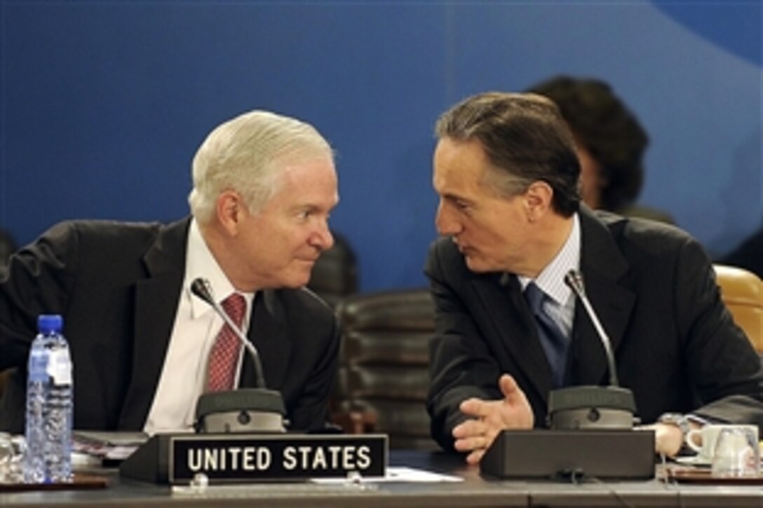 U.S. Defense Secretary Robert M. Gates and NATO Deputy Secretary General Claudio Bisogniero speak prior to the start of the NATO-Georgia Commission at NATO Headquarters in Brussels, Belgium, as part of a NATO Defense Ministerial, June 11, 2010.
