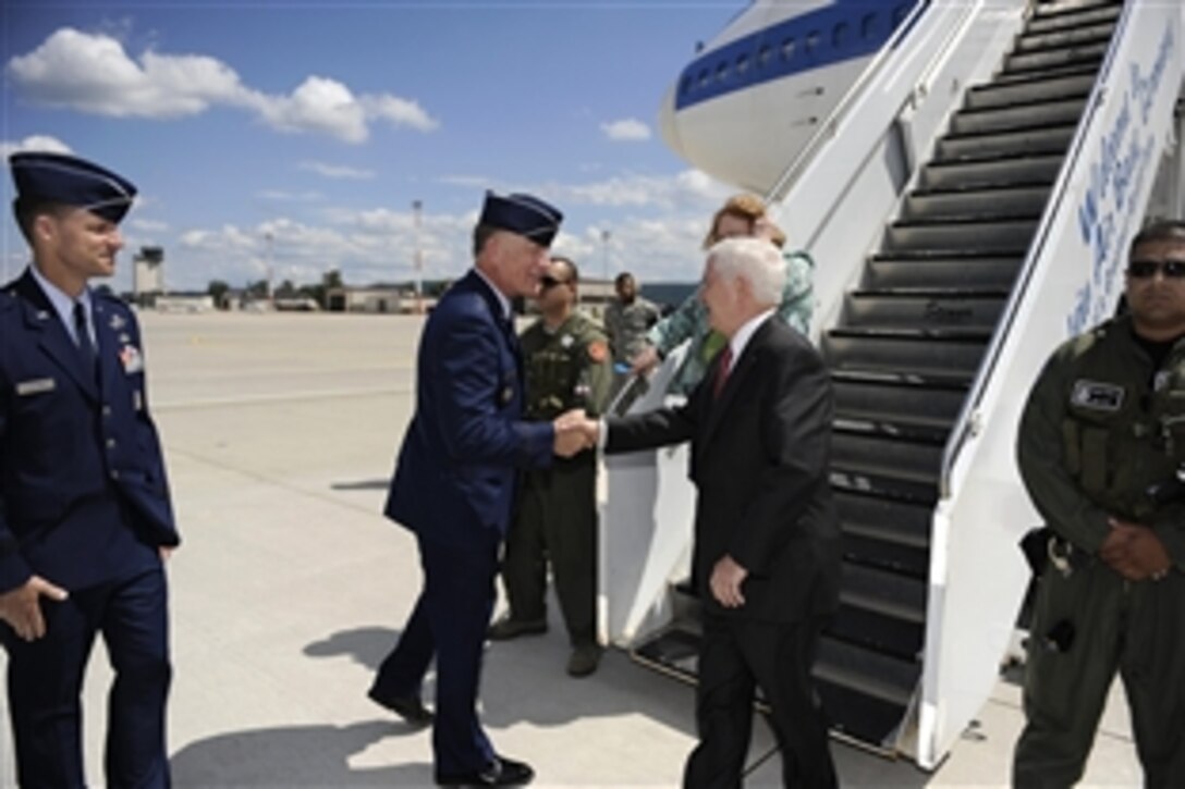 U.S. Air Force Maj. Gen. Jack B. Egginton, director, Air and Space Operations, Headquarters U.S. Air Forces in Europe, greets U.S. Defense Secretary Robert M. Gates upon his arrival to Ramstein Air Base, Germany, June 11, 2010. 
