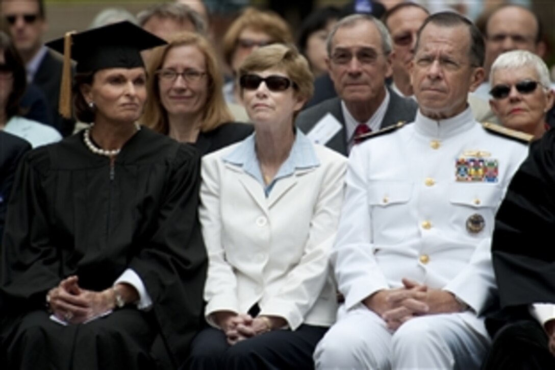 U.S. Navy Adm. Mike Mullen, chairman of the Joint Chiefs of Staff, sits with his wife, Deborah, center, and former Labor Secretary Ann McLaughlin Korologos, left, at the 2010 Pardee Rand Graduate School commencement ceremony in Santa Monica, Calif., June 12, 2010. Korologos and Mullen were presented honorary degrees from the institute that provides graduate programs in public policy.