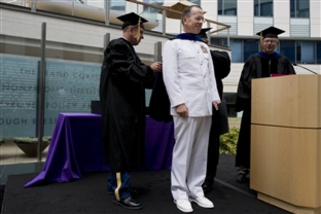 U.S. Navy Adm. Mike Mullen, chairman of the Joint Chiefs of Staff, is presented an honorary degree during the 2010 Pardee Rand Graduate School commencement ceremony in Santa Monica, Calif., June 12, 2010. Pardee Rand provides graduate programs in public policy.