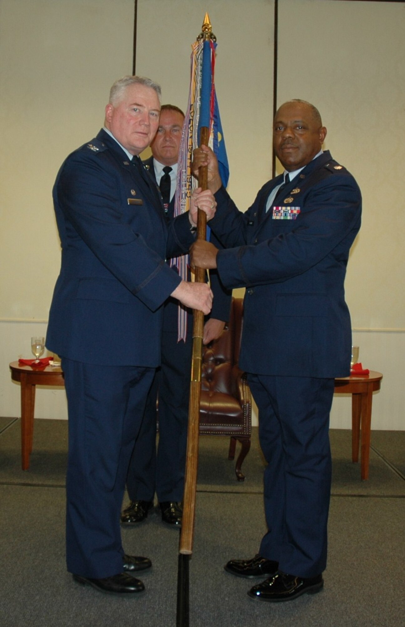 Colonel Bill Stephens, 315th Airlift Wing Mission Support Group Commander passed the guideon to the new commander of the 38th Aerial Port Squadron, Charleston Air Force Base S.C., Lt Col Jerome McLin. Lt. Col. McLin assumed command of the 38th APS from Lt. Col. Charles Drulliard who took command of the 81st APS in May. (U.S. Air Force Photo/Dani Shea)