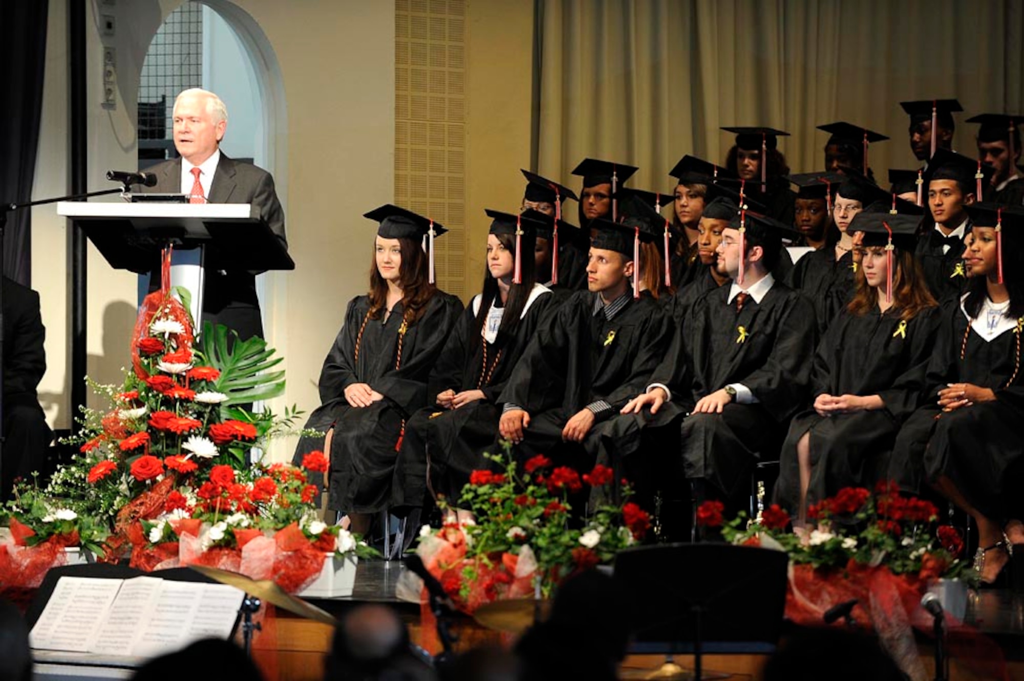 Defense Secretary Robert M. Gates gives the commencement address to Seniors of Kaiserslautern High School at the Fruchthalle in Kaiserslautern, Germany, June 11, 2010. DoD photo by U.S. Air Force Master Sgt. Jerry Morrison