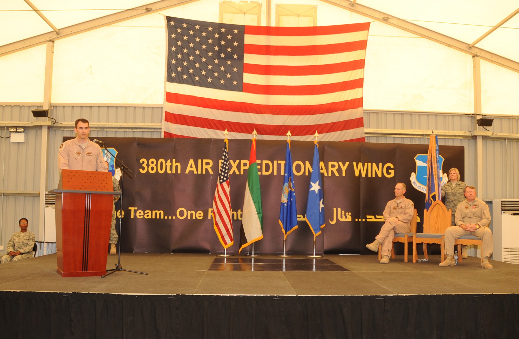 Col. Mike Minahan, 380th Air Expeditionary Wing commander, speaks during the 380th AEW change of command ceremony June 14, 2010, at a non-disclosed base in Southwest Asia. During the ceremony, Colonel Minahan took command of the wing from Brig. Gen. Bryan Benson. The 380th AEW supports operations Iraqi Freedom, Enduring Freedom and the Combined Joint Task Force-Horn of Africa. (U.S. Air Force Photo/Senior Airman Jenifer H. Calhoun/Released)