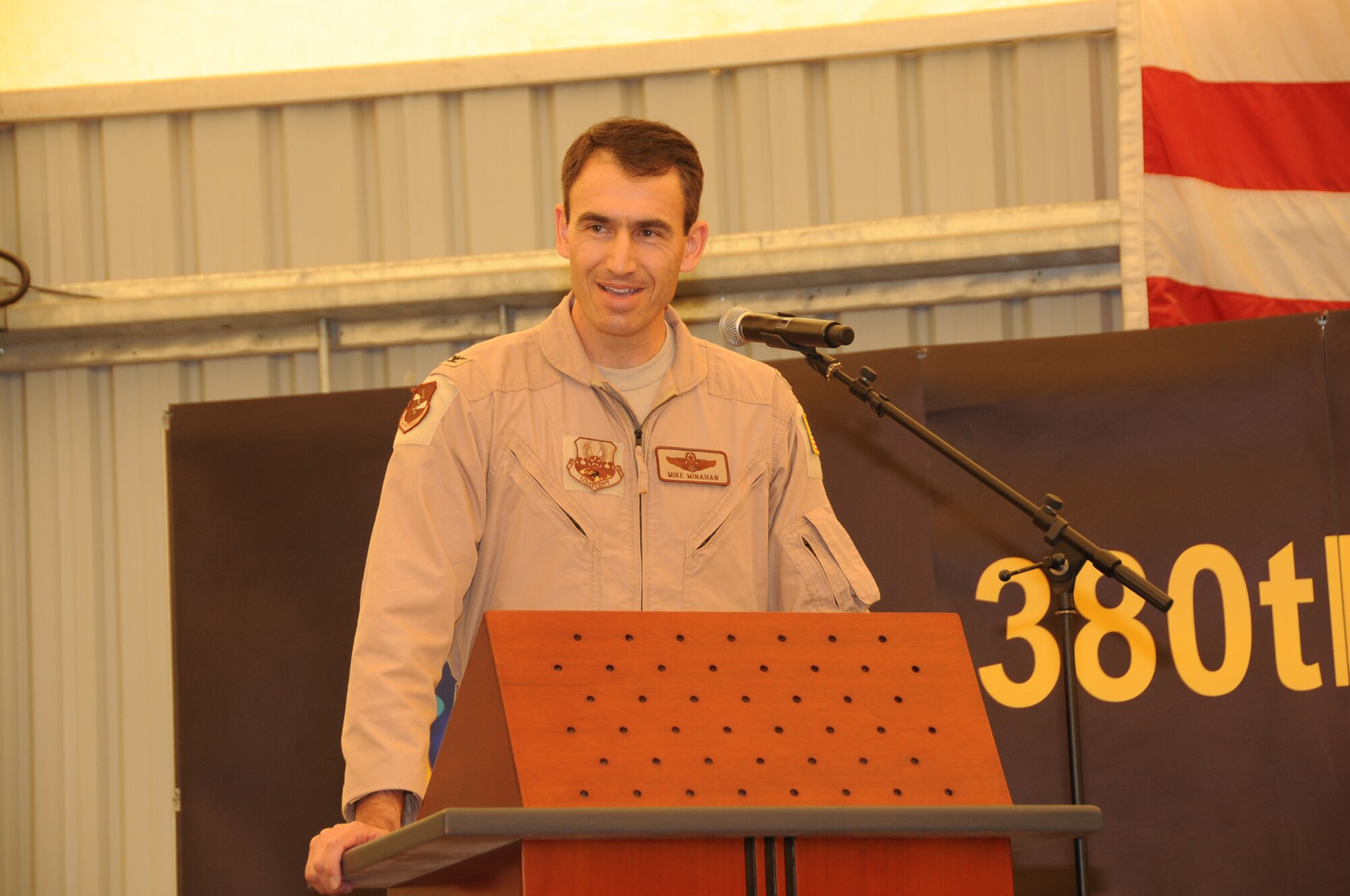Col. Mike Minahan, 380th Air Expeditionary Wing commander, speaks during the 380th AEW change of command ceremony June 14, 2010, at a non-disclosed base in Southwest Asia. During the ceremony, Colonel Minahan took command of the wing from Brig. Gen. Bryan Benson. The 380th AEW supports operations Iraqi Freedom, Enduring Freedom and the Combined Joint Task Force-Horn of Africa. (U.S. Air Force Photo/Senior Airman Jenifer H. Calhoun/Released)