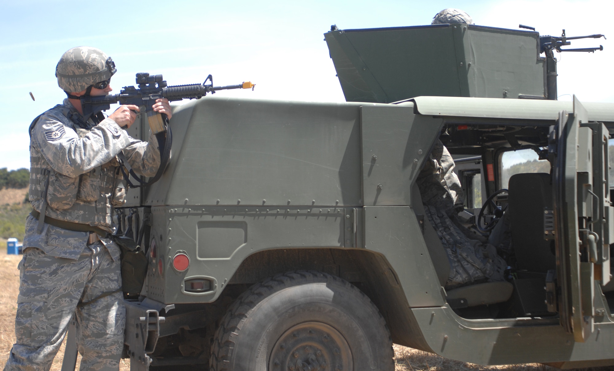 VANDENBERG AIR FORCE BASE, Calif. - Aiming down range, Staff Sgt. Christopher Abadie, of the 30th Security Forces Squadron, reacts to opposition forces and returns fire during a North Star exercise here Thursday, June 10, 2010. Airmen of Team V use are evaluated on key parts of their previous training to prepare them for real world emergencies and wartime contingencies. (U.S. Air Force photo/Senior Airman Christopher Hubenthal)

