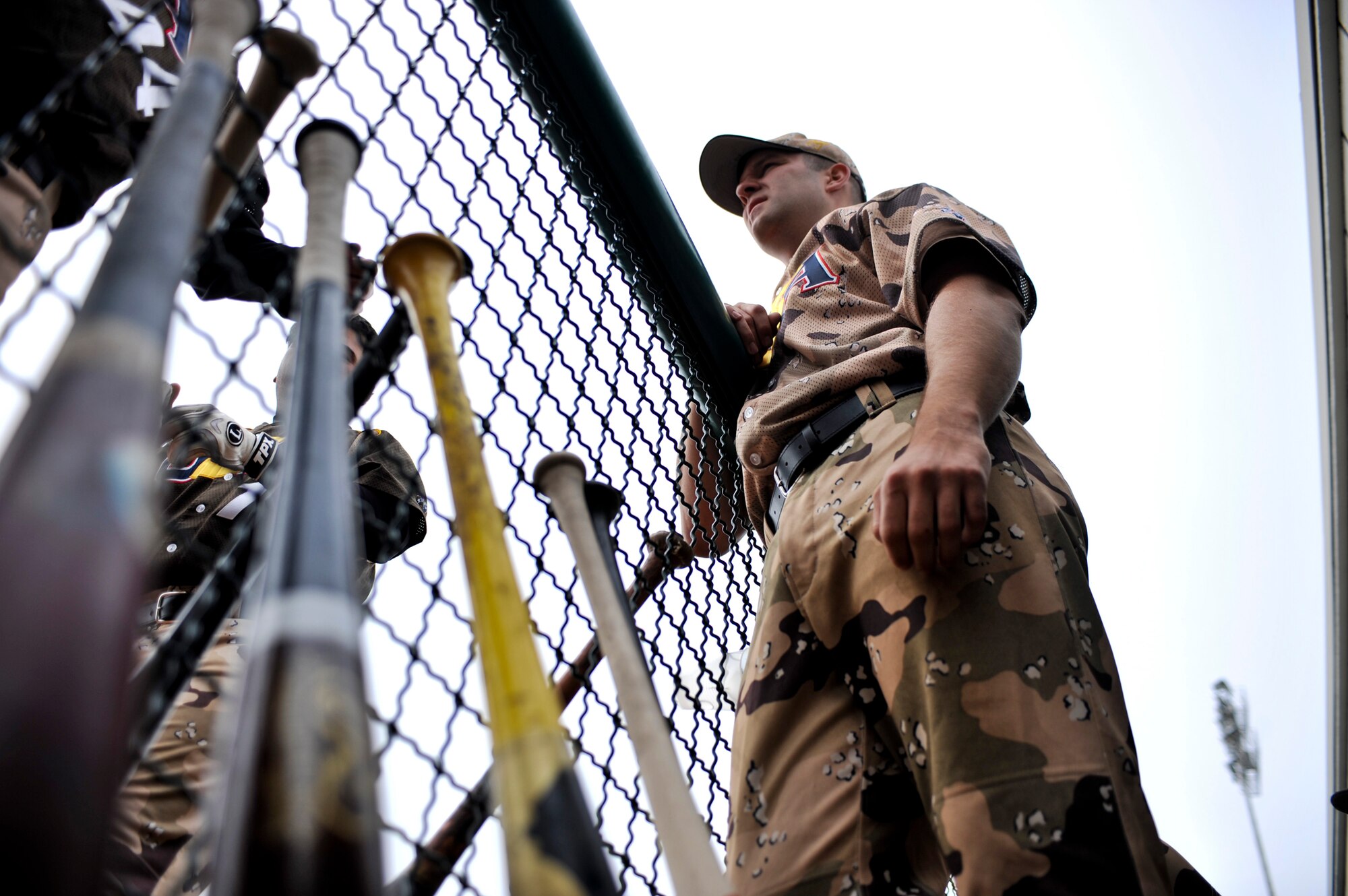 ANCHORAGE, Alaska – Chris Langley, first baseman for Heroes of the Diamond, talks with teammates during a game against the Anchorage Bucs, June 12. Mr. Langley is a captain and C-17 Globemaster III pilot for the 517th Airlift Squadron at Elmendorf Air Force Base, Alaska. The Heroes of the Diamond were established in 1990 as the Military All Stars. They are making their first stop in Alaska since being established and will play top local baseball teams on a 12-day tour which started June 12. (Air Force photo by Airman 1st Class Christopher Gross)
