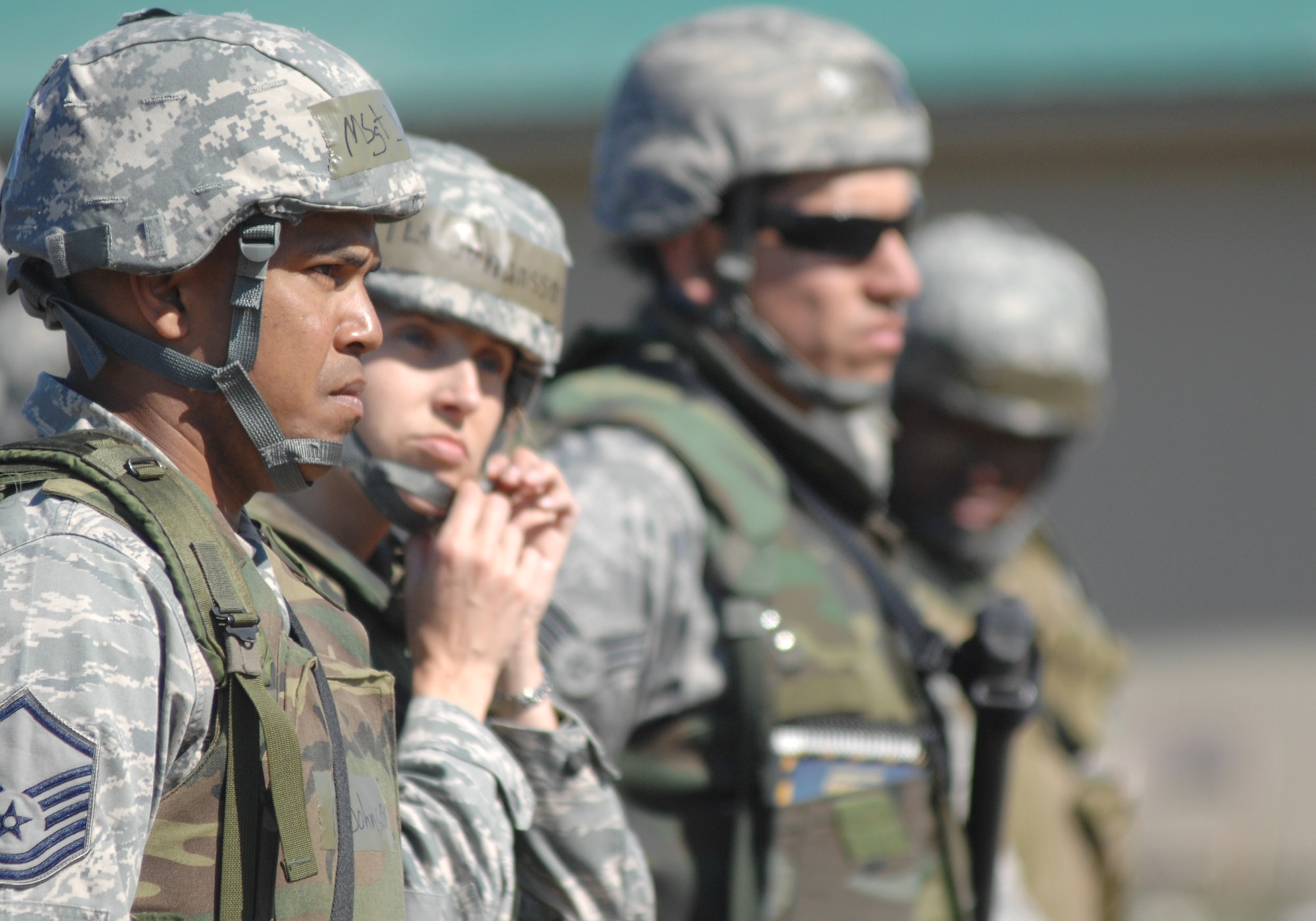VANDENBERG AIR FORCE BASE, Calif. - Master Sgt. Alvin Johnson, of the 30th Medical Support Squadron, listens to briefings with other Airmen of Team V during the North Star exercise here Thursday, June 10, 2010. The formation included safety briefings, rules of engagement, weapons awareness and words of inspiration from the North Star commander. (U.S. Air force photo/ Senior Airman Christopher Hubenthal)
