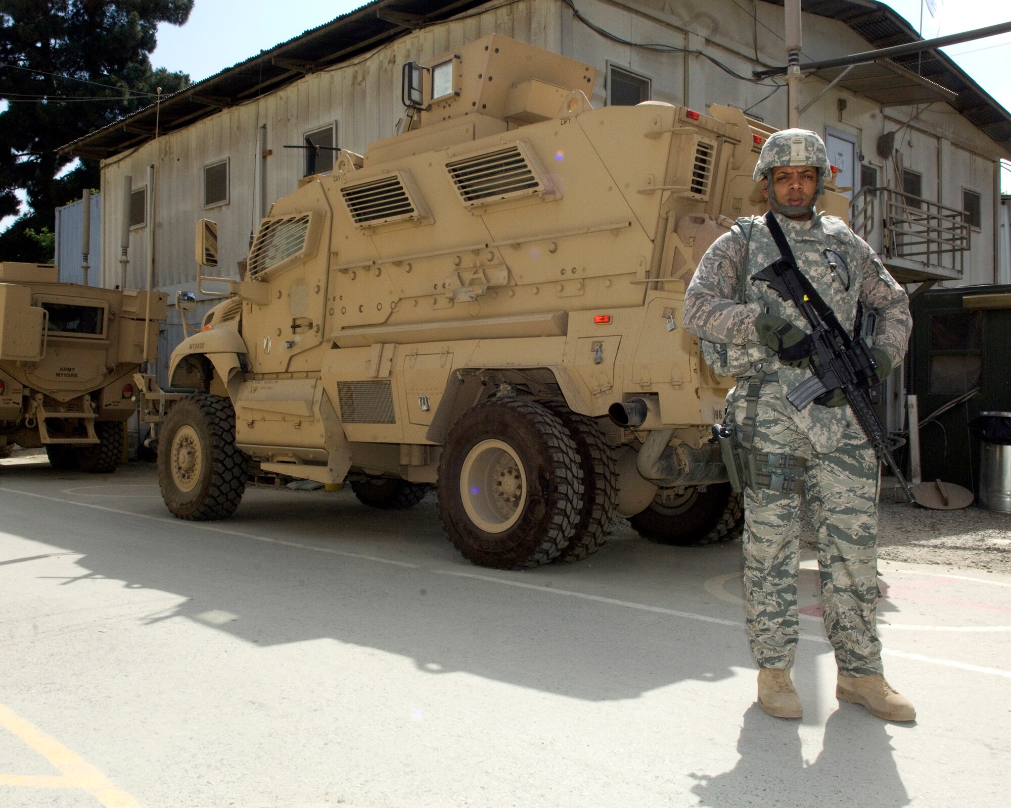 Senior Master Sgt. Limweshe D. Wright stands in front a vehicle in Camp Eggers Afghanistan, where he is currently deployed, June 10. Air Force officials recognized Sergeant Wright with the 2010 League of United Latin American Citizens Excellence in Military Service Award June 7. The award honors service members who support the DoD mission, overseas contingency operations or whose attriibutes best epitomize the qualities and the core values of their respective military service. (U.S. Air Force Photo by Staff Sgt. Jeff Nevison)