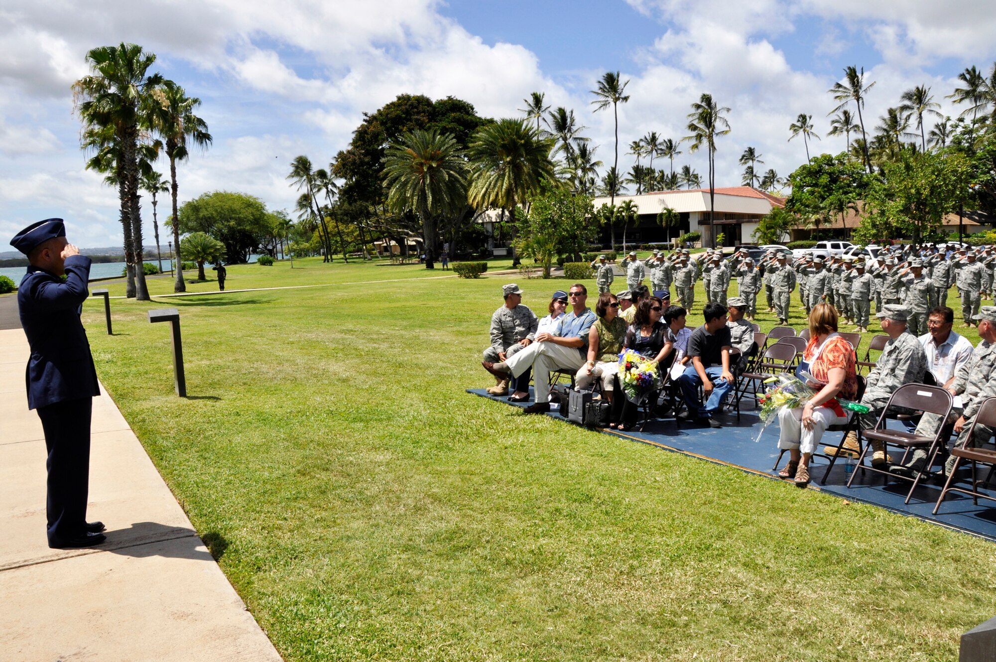 624th Civil Engineer Squadron members render their first salute to their new commander Lt. Col. Randall Honke after a change of command held at Aloha Aina Park, Joint Base Pearl Harbor Hickam, Hawaii, June 12, 2010. (U.S. Air Force photo/Master Sgt. Daniel Nathaniel III)