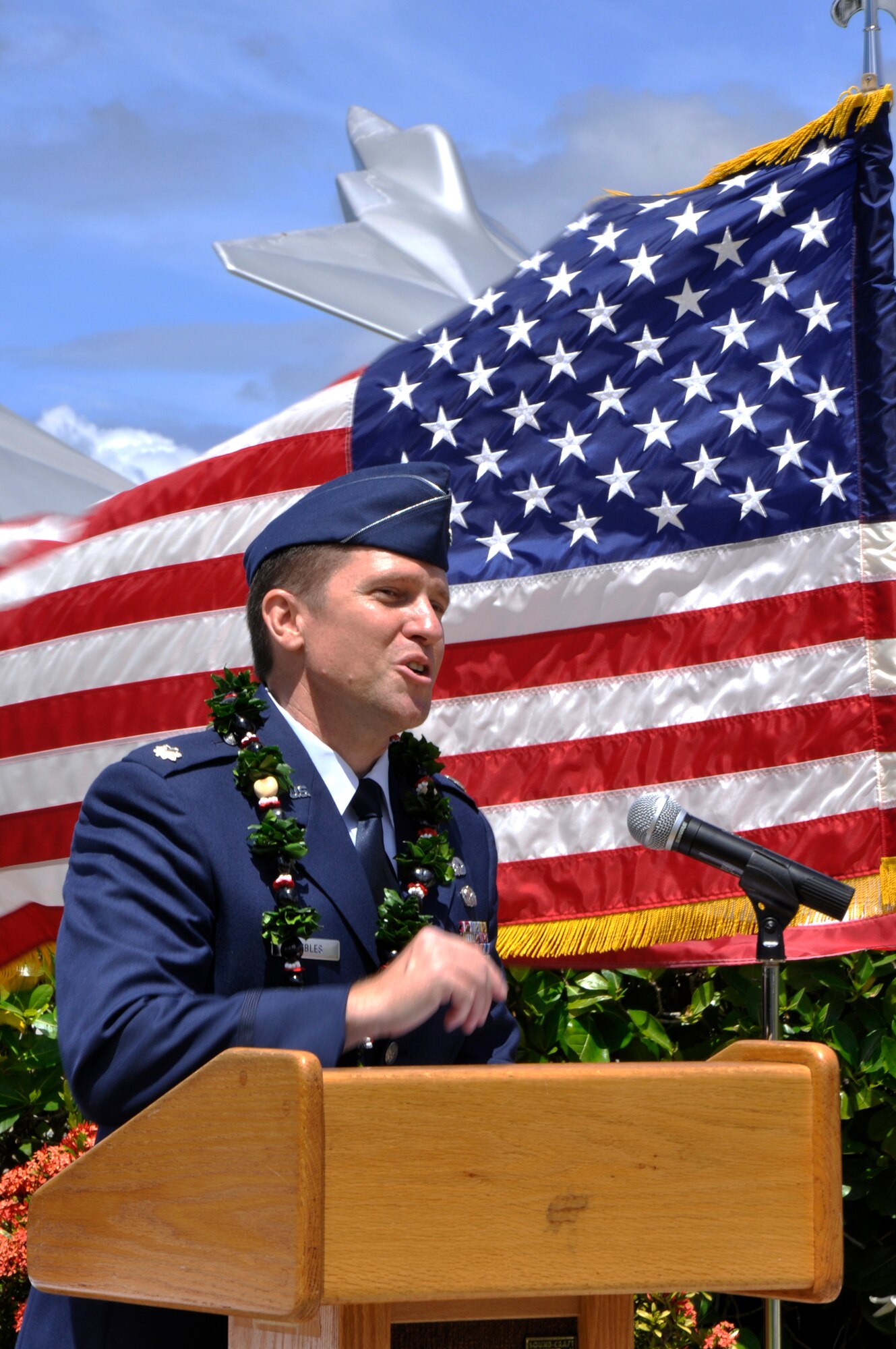 Lt. Col. Eric Peebles, the new commander of the 48th Aerial Port Squadron, addresses the audience and his squadron after a change of command held at Aloha Aina Park, Joint Base Pearl Harbor Hickam, Hawaii, June 12, 2010. (U.S. Air Force photo/Master Sgt. Daniel Nathaniel III)