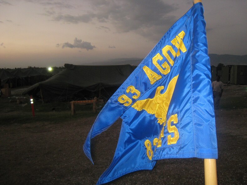 PORT-AU-PRINCE, Haiti -- The 93rd Air Ground Operations Wing and 823rd Security Forces Squadron guidon is positioned near their camp at the Toussaint L'Ouverture International Airport in Haiti's capital, Port-au-Prince. (Contributed photo/RELEASED)