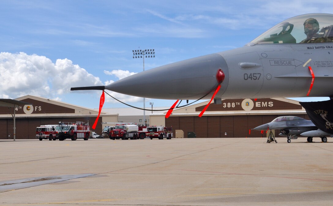 Fire trucks from the 419th Civil Engineer Squadron wait in preparation for the exercise to begin. (U.S. Air Force photo/ Staff Sgt. Kyle Brasier)